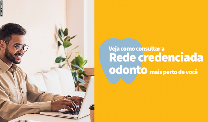 Imagem de um homem usando um notebook e a frase Veja como consultar a rede credenciada odonto mais perto de você